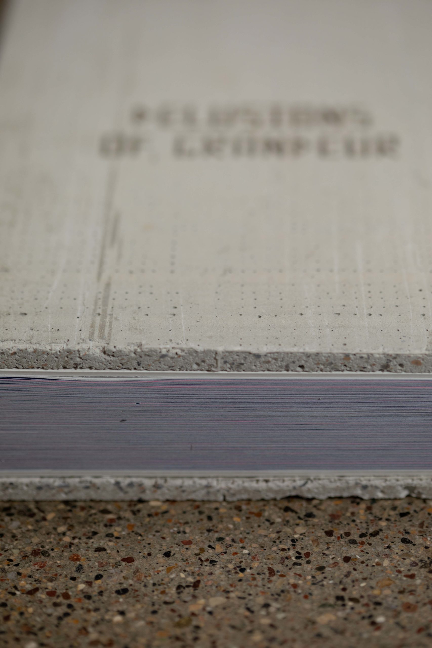 288 page Smythe sewn book with unique laser engraved concrete cover