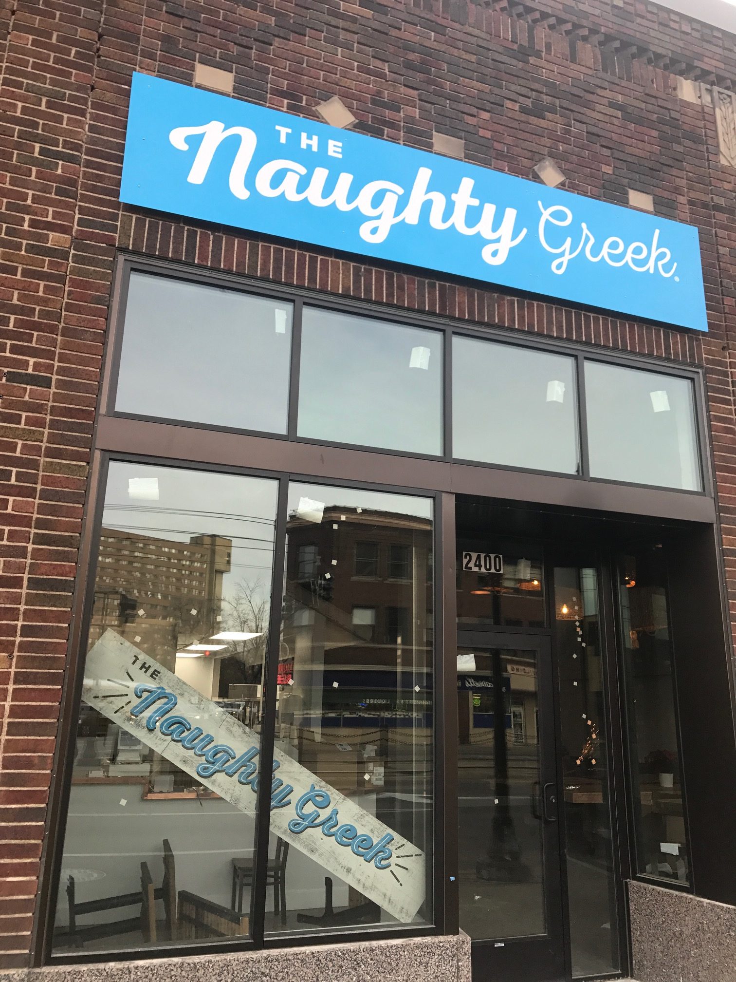 Naughty Greek exterior signage window decals and marquee signs